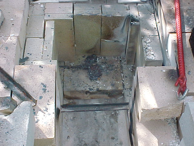 furnace interior after I cleaned out the copper slag.jpg